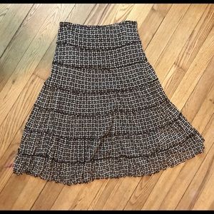 Long broom style skirt.